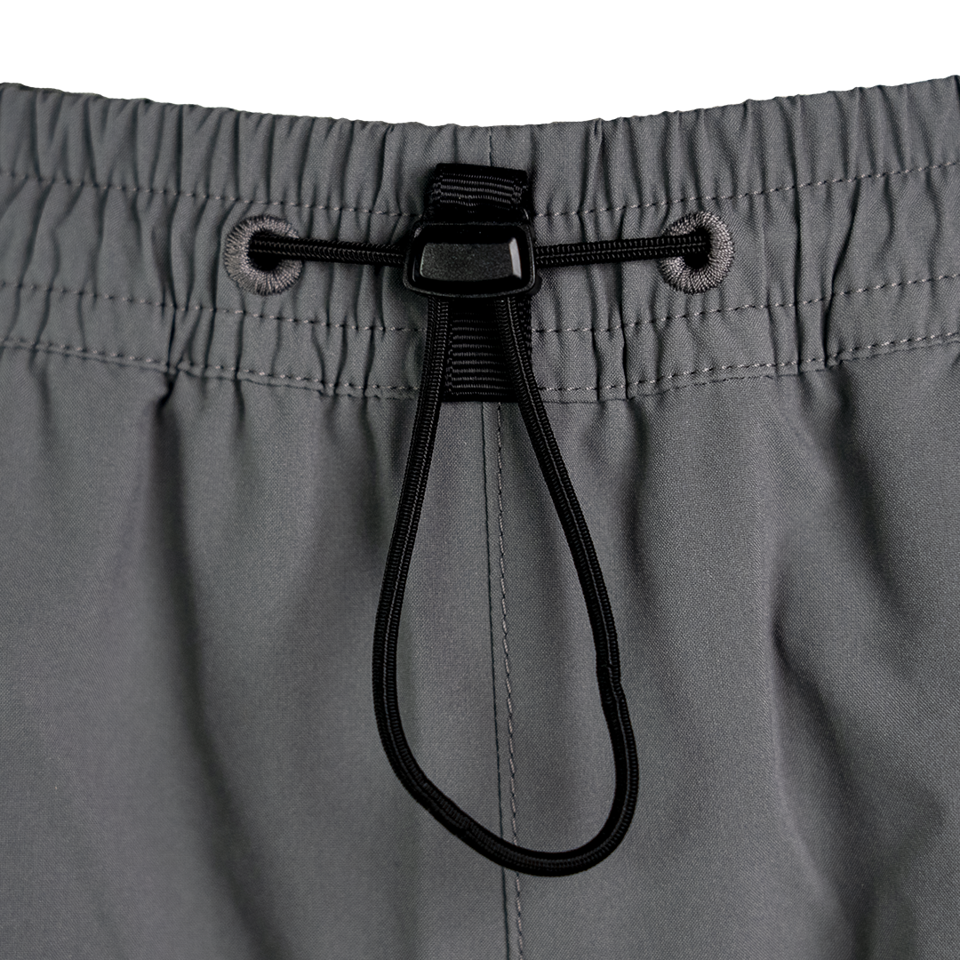 close view of elastic hem & cinch cord adjuster on Skyline Joggers