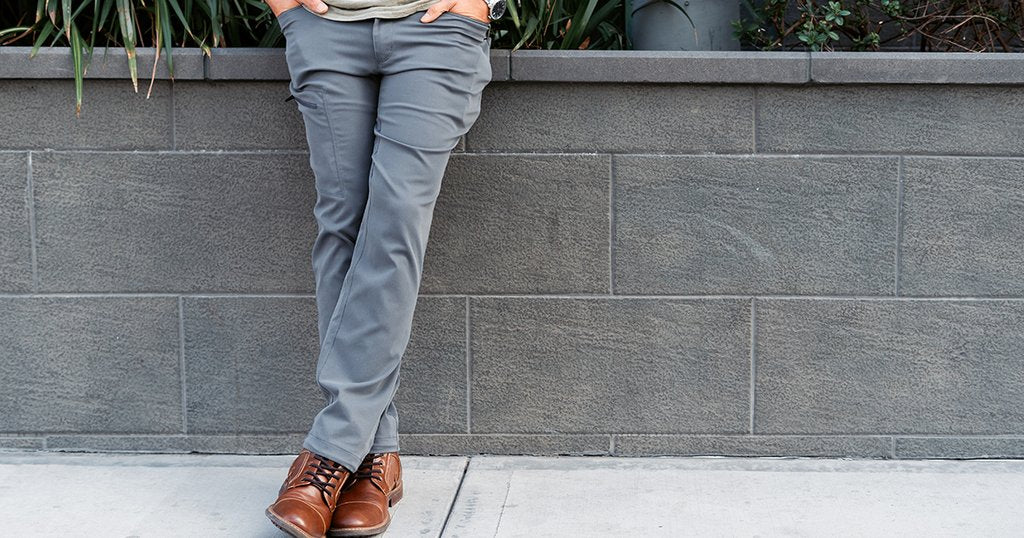 Front view of Outdoor Vitals Satu Adventure Pants worn in a casual setting.