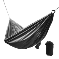 Outdoor Vitals Ultralight Complete Hammock suspended with attached structural ridgeline alongside its included stuff sack.