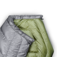 Close-up of a backpacking quilt showing the unique taper that causes the quilt to wrap naturally around your shoulders.