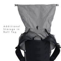 Rear view of the Shadowlight 60 backpack with roll-top closure open, showing main compartment expansion capacity.