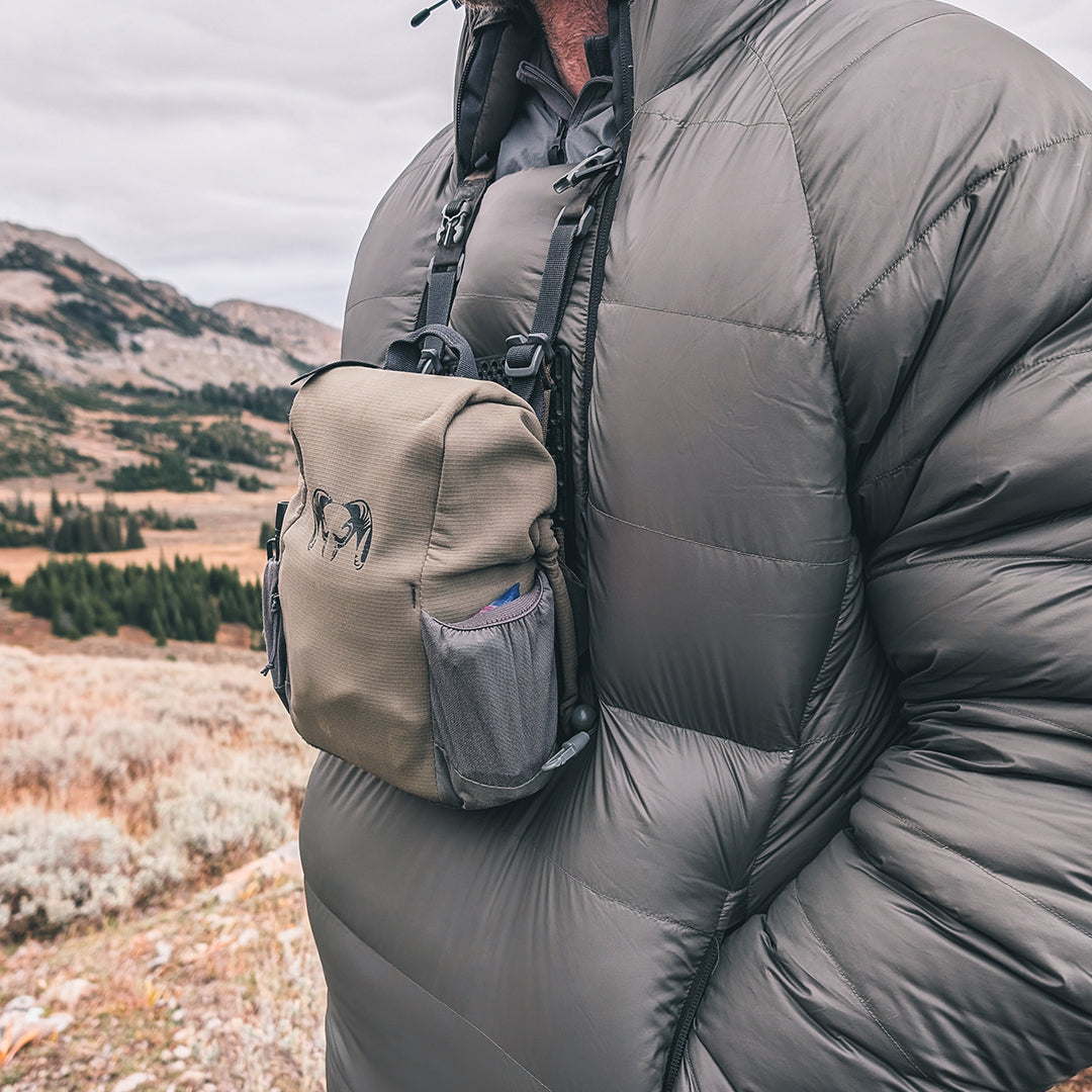 bino harness shown in use with Resolve Down Anorak.