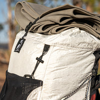 close side view of CS40 Ultra Backpack with closed cell foam pad strapped on top