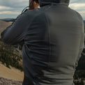 close rear view of hybrid fleece hoodie on man 