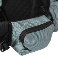 Side profile of the Shadowlight Ultralight Backpack highlighting its spacious hip belt pockets