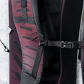 Close-up view of the Outdoor Vitals CS40 Ultra Backpack padded shoulder strap, highlighting the adjustable sternum strap buckle and webbing attachment loops.