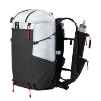 45 degree perspective view of the Outdoor Vitals Skyline 30 Fastpack showcasing the large front stretch-mesh pocket, side compression cording, vest-style shoulder straps with a soft flask inserted, and bottom gear attachment cords.