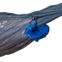 Close-up of the Outdoor Vitals StormLoft Down UnderQuilt draft collar and shock cord cinch system cinched tight around a hammock end.