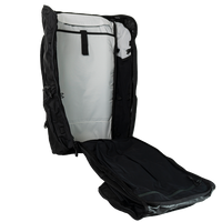 Fully opened main compartment of the Outdoor Vitals KotaUL Ultralight Travel & Adventure Backpack, displaying a clamshell zipper design, light-colored contrast lining, and a hydration bladder sleeve with a secure attachment loop.