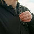 Zipping up the Nebo Windbreaker front pocket