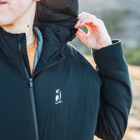 Close-up of the Women's Outdoor Vitals Vario Jacket hood being adjusted